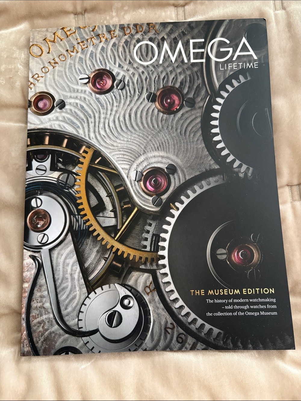Omega Lifetime Museum Edition Book with Gold and Silver Accents